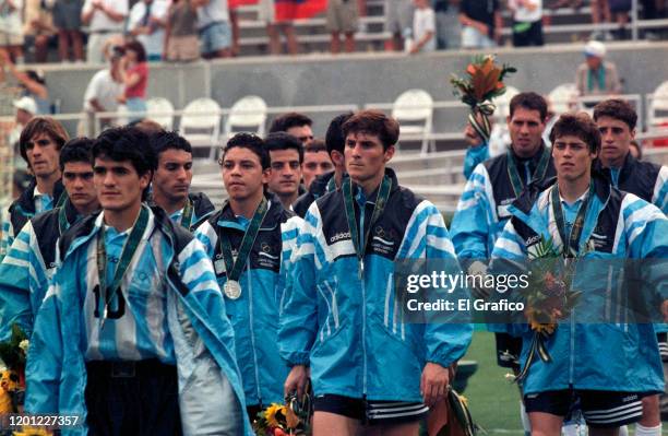 Silver medalists Ariel Ortega, Marcelo Galardo, Javier Zanetti and Matias Almeyda of Argentina react on the podium after the Men's Football Final...