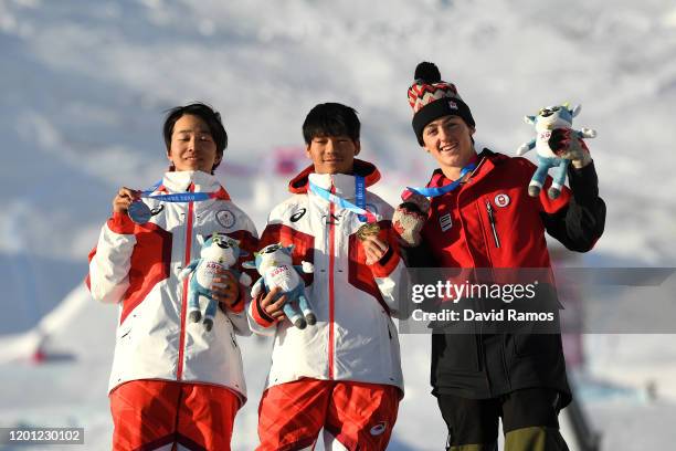 Silver medalist Aoto Kawakami of Japan, gold medalist Ryoma Kimata of Japan and bronze medalist Liam Brearley of Canada pose for a photo during the...