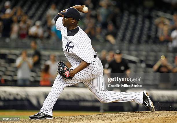 Rafael Soriano of the New York Yankees delivers a pitch against the Baltimore Orioles in the ninth inning on July 30, 2011 at Yankee Stadium in the...