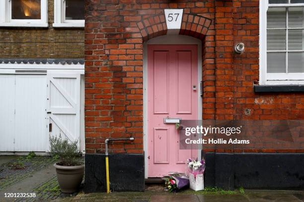 Flower tributes laid outside the home of former Love Island host Caroline Flack on February 16, 2020 in London, England. The TV presenter was was...