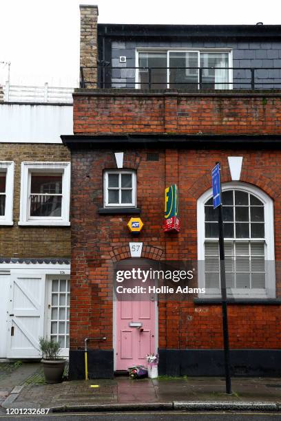 Flower tributes laid outside the home of former Love Island host Caroline Flack on February 16, 2020 in London, England. The TV presenter was found...