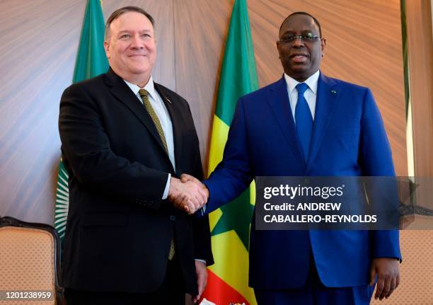 Secretary of State Mike Pompeo meets with Senegalese President Macky Sall at the Presidential Palace in Dakar on February 16 as part of his first...
