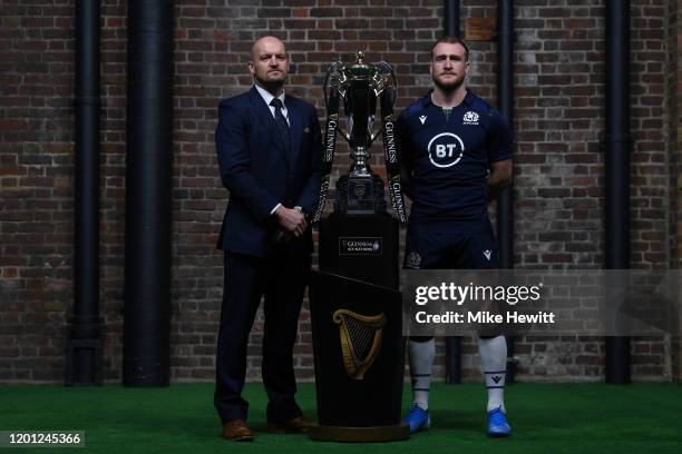 Coach Gregor Townsend and Captain Stuart Hogg of Scotland pose with the Six Nations Trophy during the Guinness Six Nations Launch at Tobacco Dock on...