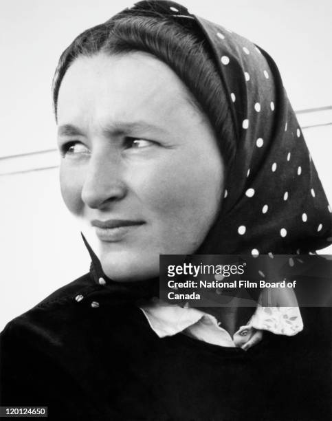 Portrait of a young Hutterite mother, Northeast Alberta, Canada, 1963. Photo taken during the National Film Board of Canada's production of 'The...