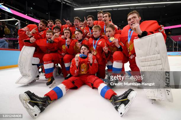 Gold medalist team of Russian Federation pose for a photo after the Medal ceremony after the Men's 6-Team Ice Hockey Tournament on day 13 of the...