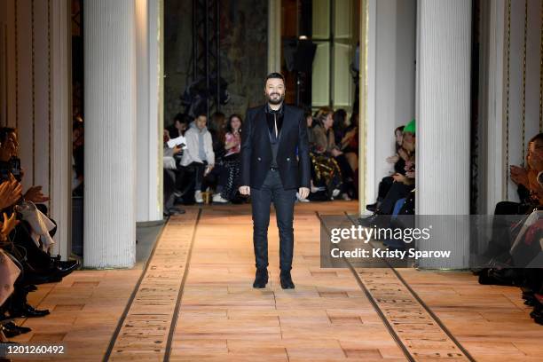 Designer Zuhair Murad acknowledges the audience during the Zuhair Murad Haute Couture Spring/Summer 2020 show as part of Paris Fashion Week on...