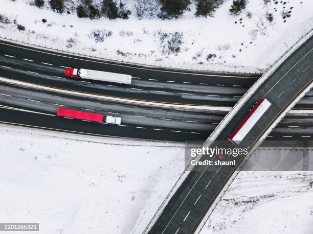 winter trucking - snowy road stock pictures, royalty-free photos & images