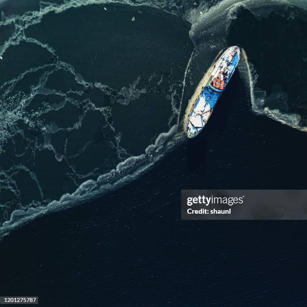 ship on ice edge - ice floe stock pictures, royalty-free photos & images