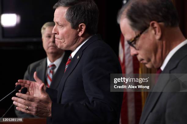 Sen. Steve Daines speaks as Sen. Lindsey Graham and Sen. Mike Braun listen during a news conference on the Senate impeachment trial against President...