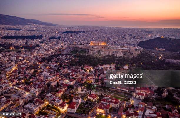 panoramic aerial photo of acropolis and monastiraki, downtown athens, greece, at night - athens - greece stock pictures, royalty-free photos & images