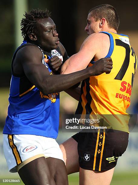 Majak Daw of the Tigers collides with Michael Gardiner of the Zebras during the round 18 VFL match between Sandringham and Werribee at Trevor Barker...