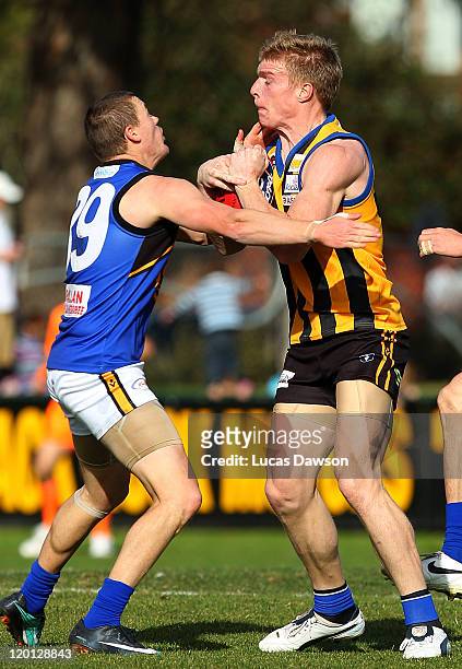 Tommy Walsh of the Zebras is tackled during the round 18 VFL match between Sandringham and Werribee at Trevor Barker Beach Oval on July 31, 2011 in...