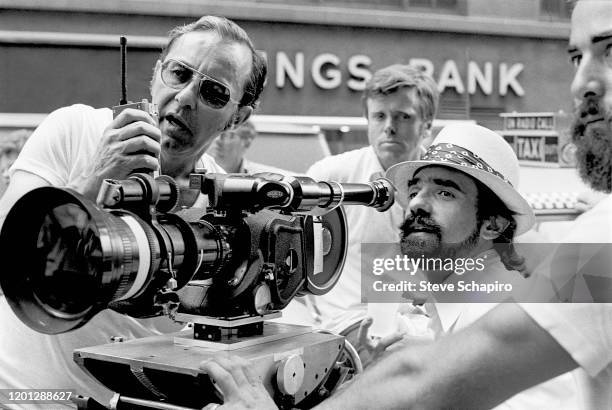 View of American director Martin Scorsese and his camera crew during the filming of 'Taxi Driver,' New York, New York, 1975.