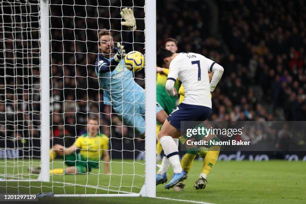 Heung-Min Son of Tottenham Hotspur scores his sides second goal during the Premier League match between Tottenham Hotspur and Norwich City at...