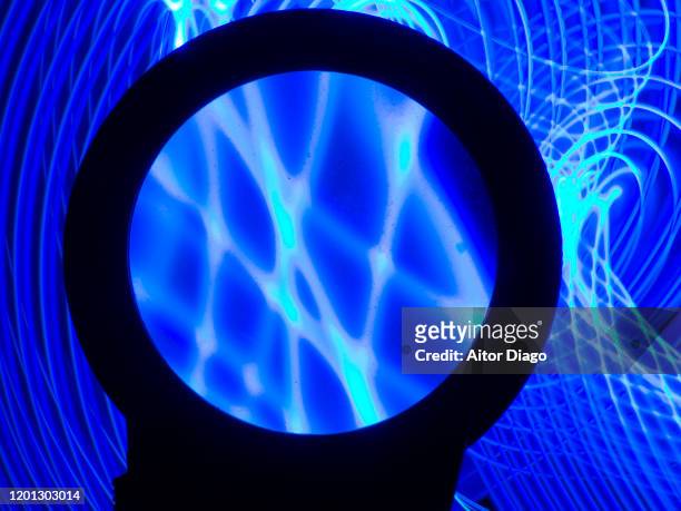 network analysis through a magnifying glass. - surgical loupes stock pictures, royalty-free photos & images