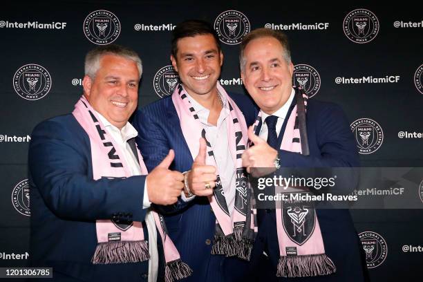 Sporting Director Paul McDonough, head coach Diego Alonso, and managing owner Jorge Mas pose for a photo during a introductory press conference for...