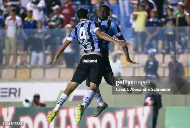 Alison Calegari and Elias de Paula of Gremio celebrate the first goal of their team during the match against Oeste for the Semi-final Copa Sao Paulo...