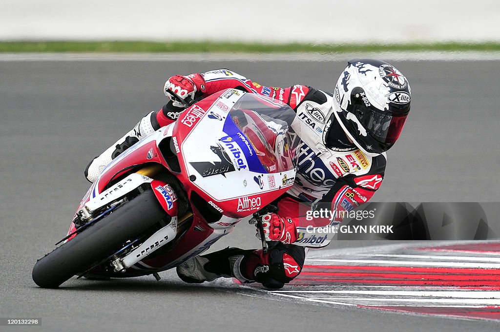 Spain's Carlos Checa takes a curve durin