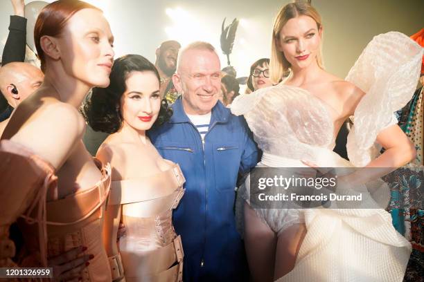 Karen Elson, Dita Von Teese, Jean-Paul Gaultier and Karlie Kloss are seen backstage after walking the runway at the Jean-Paul Gaultier 50th Birthday...