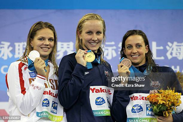 Gold medalist Jessica Hardy of the United States poses with silver medalist Yuliya Efimova of Russia and bronze medalist Rebecca Soni of the United...