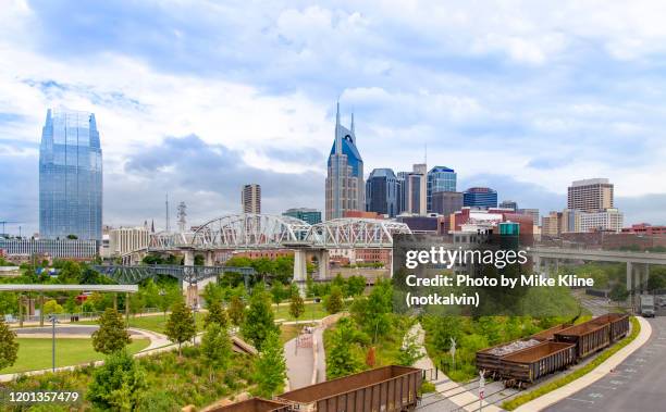 nashville skyline with cumberland park - nashville park stock pictures, royalty-free photos & images