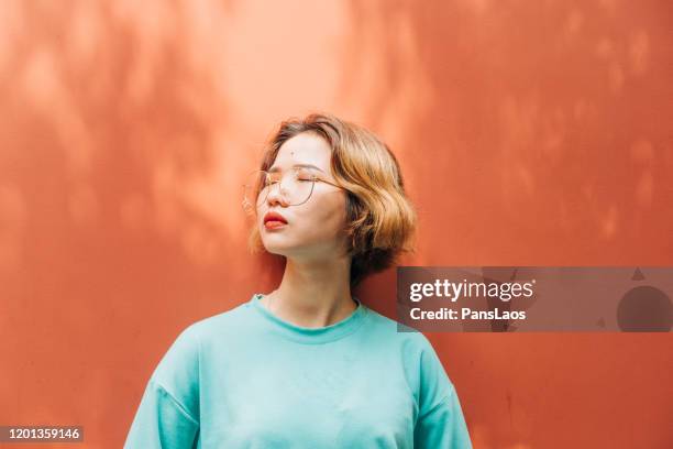 portrait of fashion real young asian woman with glasses - street fashion asian stock pictures, royalty-free photos & images