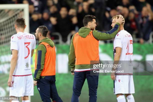 Ragnar Klavan and Luca Ceppitelli of Cagliari at the end of the Serie A match between Cagliari Calcio and SSC Napoli at Sardegna Arena on February...