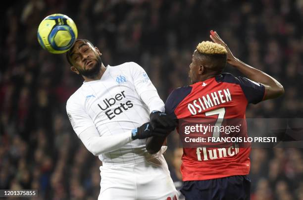 Lille's Nigerian forward Victor Osimhen vies with Marseille' French defender Jordan Mamavi during the French L1 football match between Lille LOSC and...