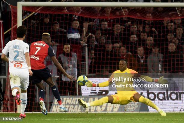 Lille's Nigerian forward Victor Osimhen scores a goal during the French L1 football match between Lille LOSC and Olympique de Marseille at the...