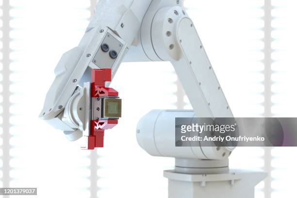 robotic arm holding processor - korea technology stock pictures, royalty-free photos & images