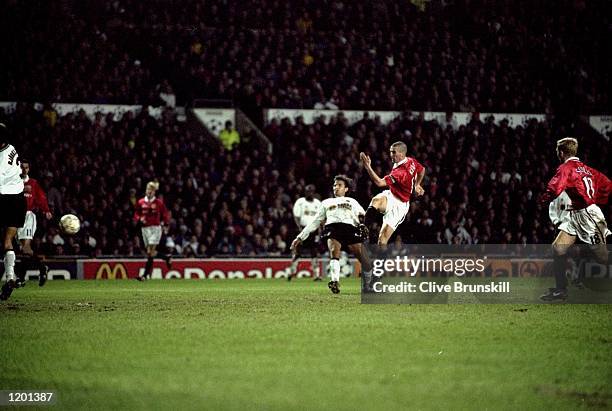 Roy Keane shoots to score the first goal for Manchester United during the Champions League game against Valencia at Old Trafford, manchester,...