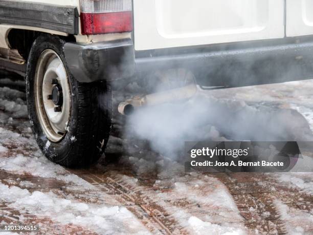 close-up of car exhaust pipe, car with diesel engine. - beat up car stock pictures, royalty-free photos & images