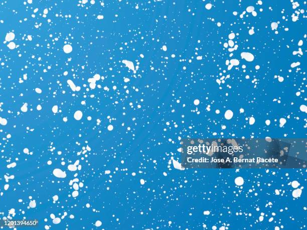 figures and abstract forms of milk on a blue background. - splash crown stock pictures, royalty-free photos & images
