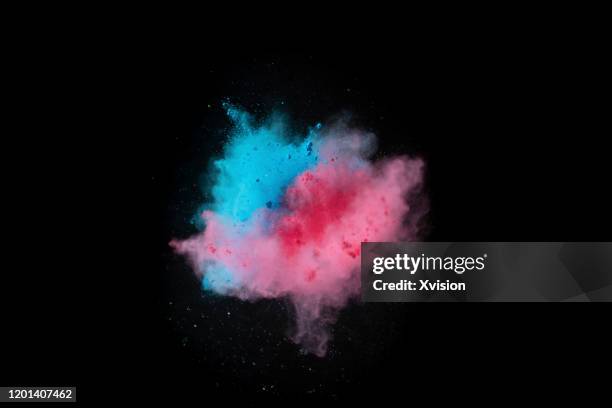 explode color powder captured with high speed sync. - powder blue ストックフォトと画像