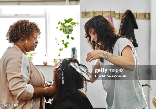 you're going to love this! - african american hair salon stock pictures, royalty-free photos & images