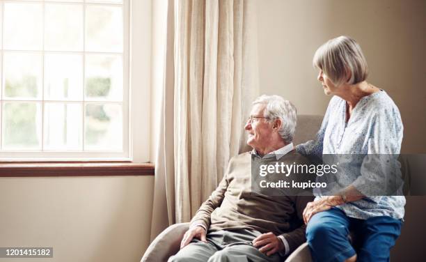 real comfort is a life lived together - alzheimer's disease stock pictures, royalty-free photos & images