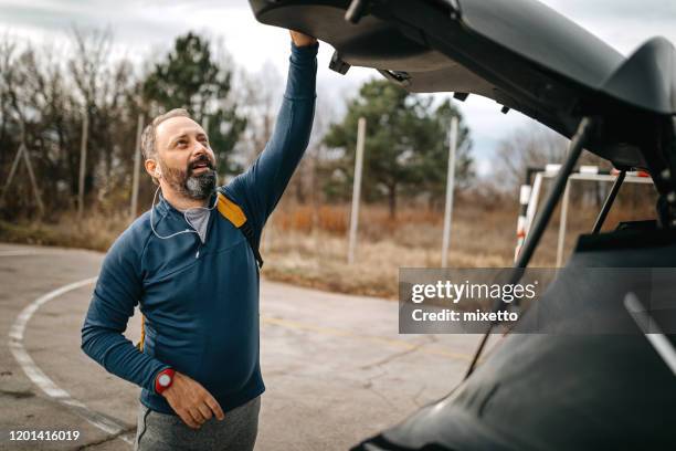 i'm ready for running during beautiful day - car trunk closed stock pictures, royalty-free photos & images
