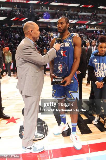 Kawhi Leonard of Team LeBron is rewarded the Kobe Bryant All-Star Game MVP Award the during the 69th NBA All-Star Game on February 16, 2020 at the...