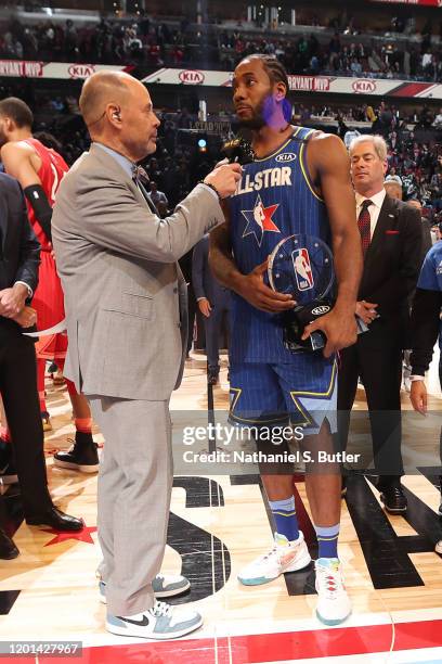 Kawhi Leonard of Team LeBron is rewarded the Kobe Bryant All-Star Game MVP Award the during the 69th NBA All-Star Game on February 16, 2020 at the...