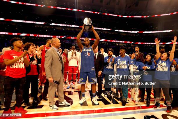 Kawhi Leonard of Team LeBron is rewarded the Kobe Bryant All-Star Game MVP Award the during the 69th NBA All-Star Game on February 16, 2020 at the...