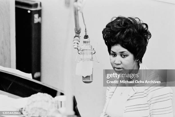 American singer, songwriter, pianist, and civil rights activist Aretha Franklin during a recording session of studio album 'This Girl's in Love with...