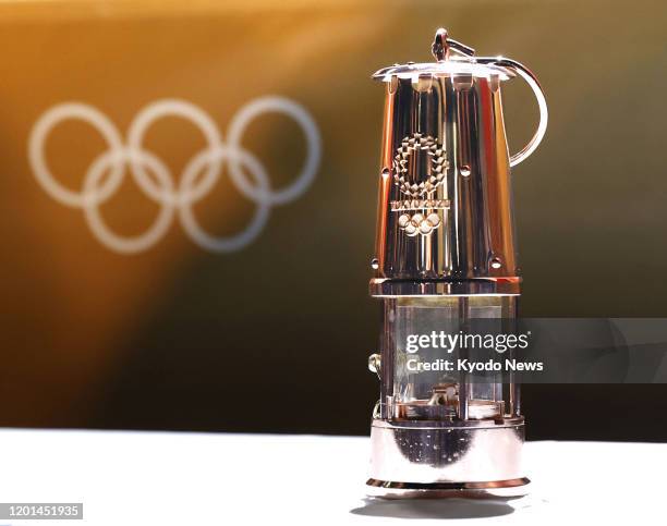 File photo taken in Hachioji, western Tokyo, on Feb. 15 shows a lantern to be used during the Tokyo Olympic torch relay as the flame is set to be...