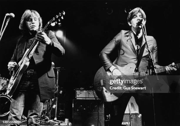 Welsh singer-songwriter, guitarist, actor and record producer Dave Edmunds and English singer-songwriter, musician and producer Nick Lowe performing...