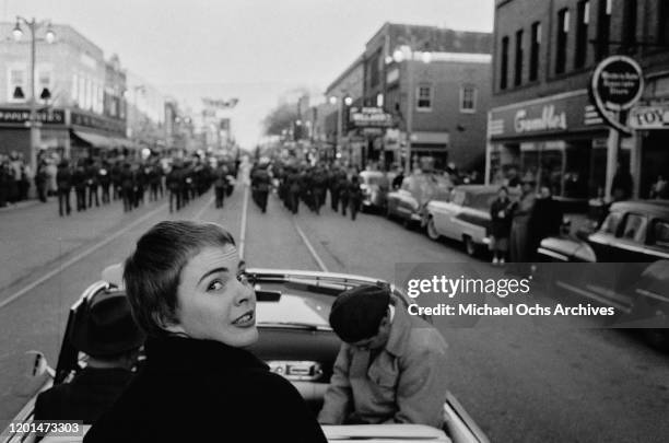 American actress Jean Seberg taking part in a parade celebrating her return to her home town of Marshalltown, Iowa, 26th March 1957. Seberg has just...