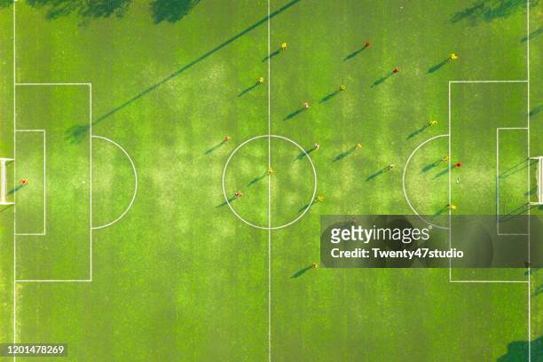 aerial view of soccer field or football field with motion of prayer in match. top view - fotbollsmästerskap bildbanksfoton och bilder