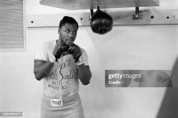 Picture taken in January 1973 of US heavyweight boxing champion Joe Frazier during a training in Kingston before his match against George Foreman.