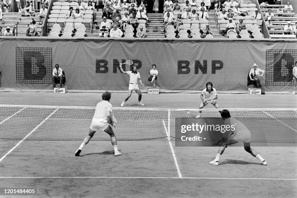 American tennis players Fred Mc Nair and Sherwood Stewart in action during the men's double final here 11 june 1976 at the French tennis Open in...