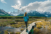 Woman hiking near  Fitz Roy mountain in Patagonia