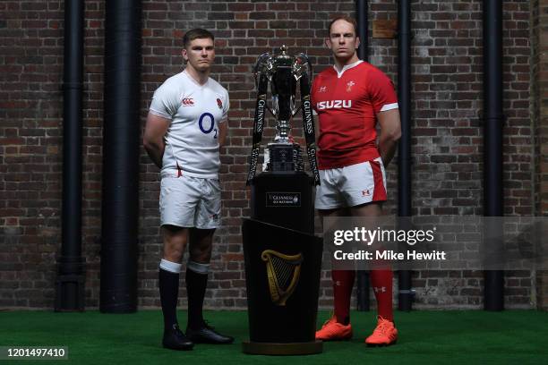 Captains Owen Farrell of England and Alun Wyn Jones of Wales pose with the Six Nations Trophy during the Guinness Six Nations Launch at Tobacco Dock...