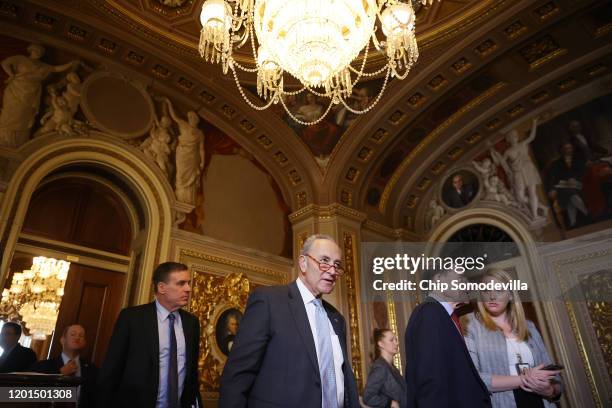 Sen. Mark Warner , Senate Minority Leader Charles Schumer and Sen. Richard Blumenthal head into the Senate Chamber before the start of the third day...